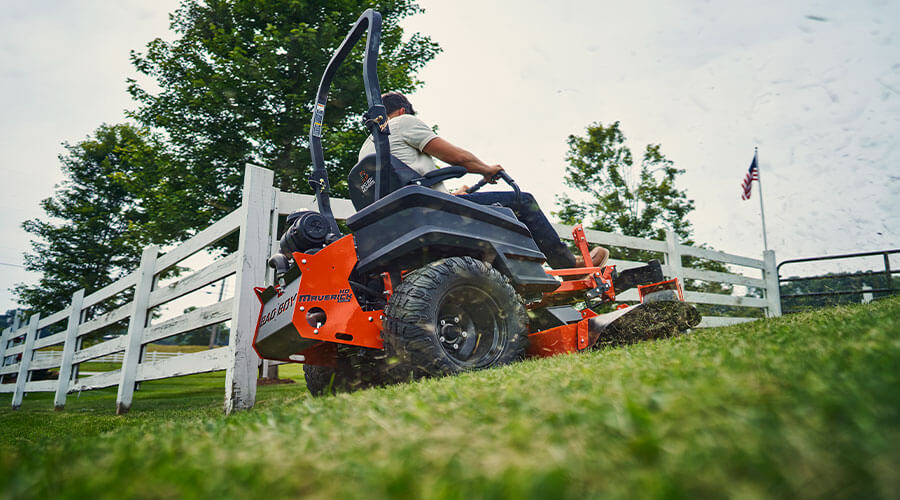 Bad Boy Maverick zero-turn mower delivering a professional-quality cut on a residential property.